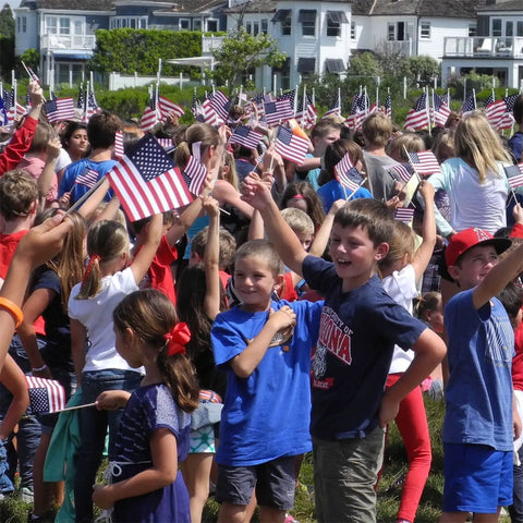 Children waving 50 Pack Small American Flags On Sticks 4x6 Outdoor Flags For 4th Of July Memorial Day Decor Polyester UV Resistant Durable