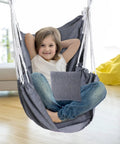 Child sitting in Two Piece Hammock Chair Set With Cushions For Indoor Outdoor Use Large Hanging Rope Swing Seats Gray Supports Up To 300 Lbs
