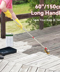 Person using 60 Inch Long Handle Deck Stain Brush Kit With 7 Inch Deck Stain Brush on wooden deck