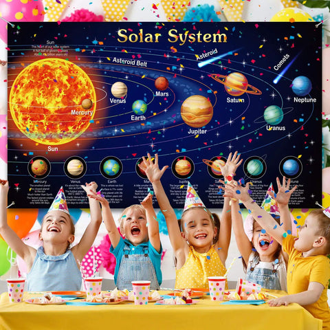 Children celebrating under Giant Solar System Poster Banner For Space Themed Parties And Classroom Decor, 72.8 by 43.3 inches.