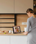 Walnut Wood Cookbook Stand Hands Free Reading For Kitchen Tablet Holder on counter with recipe displayed on tablet