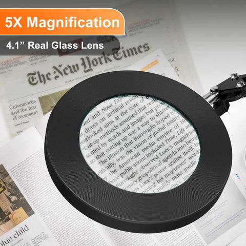 5X Magnifying Lamp With Clamp And Dimmable LED Light showing clear close-up of newspaper text for detailed work.