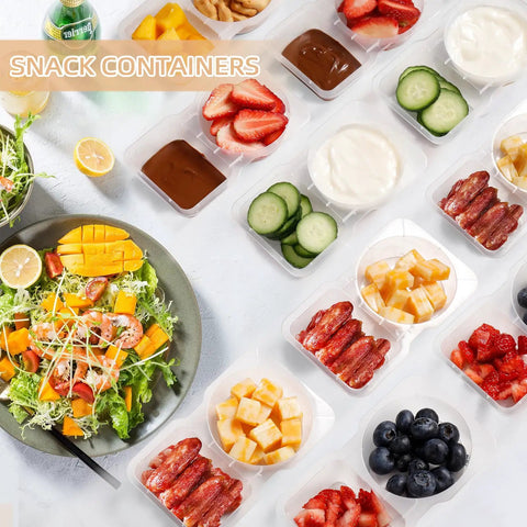 Two Compartment Snack Containers With Lids For Meal Prep And On The Go Storage Double Snack Boxes For Travel Or Camping With Portion Control Ideal Portable Lunch Box For Fresh Foods, filled with various fruits, salads, and dressings