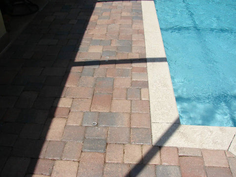Tough As Nails Hydrophobic Acrylic Sealer For Masonry And Concrete Pavers delivers a slick water beading formula near swimming pool pavers.