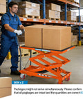 Heavy Duty Hydraulic Lift Table Cart, 770 Lbs Capacity, 50 Inch Rise, rolls smoothly with boxes in a warehouse setting.
