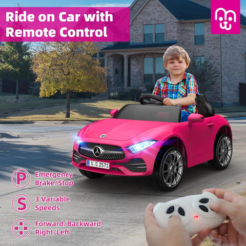 Child driving 12V Licensed Kids Ride On Electric Car With Remote Control, Pink Battery Powered Toddler Roadster, on driveway