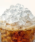 Chewable Cafe Style Nugget Ice Maker For Home And Office And RV 33 Lb Per Day Countertop Machine ice in a glass of soda