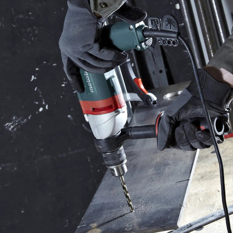 Heavy Duty One Half Inch High Torque Drill With Solid Six Point Seven Amp Motor And Wide Speed Range From Zero To Six Hundred Fifty Rpm drilling metal sheet