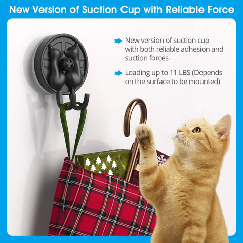 Double Cat Suction Cup Hooks 4 Pack Heavy Duty Wall Holders With Rock Solid Vacuum Grip For Bathroom Shower Towels Coats Waterproof Matte Silver. Cat reaching for items on a mounted hook.