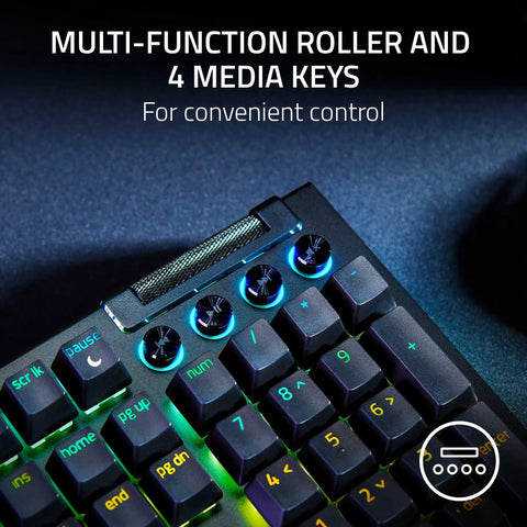 Top Tier Mechanical Gaming Keyboard With Kickass Clicky Green Switches And Lightning Fast Actuation Paired With Sleek Per Key RGB Underglow Lighting showing multi-function roller and media keys for convenient control.