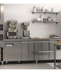 Heavy Duty Commercial Undercounter Freezer 27 Inch 6 Cubic Foot Stainless Steel Auto Defrost in modern kitchen setup.