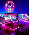 Mushroom Neon Sign For Gaming Room Decor Red LED Wall Light above dual monitors in a vibrant gaming setup.