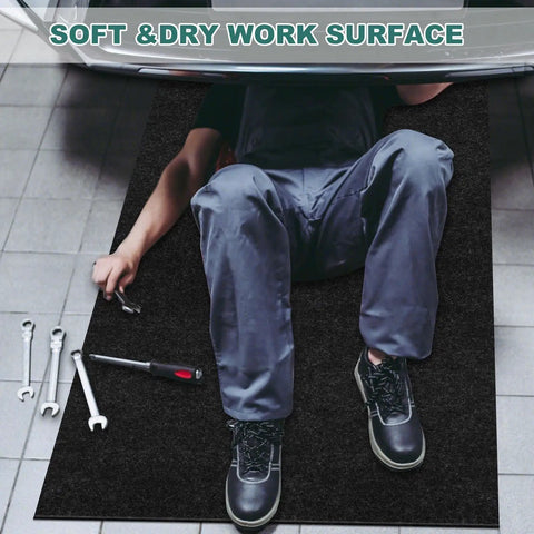 Mechanic working under car on 36x60 Inch Oil Drip Mat For Garage And Driveway, Reusable Absorbent Spill Pad With Waterproof Non Slip Backing