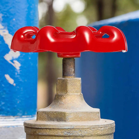 Red cast iron hand wheel, part of 10 Piece Cast Iron Shutoff Hand Wheels With Flat Bottom Grips For Unobstructed Fluid Flow And Reduced Sundries Deposition A Heavy Duty Workhorse For Industrial Doors Valves And Gate Applications With Durable Non Slip Grip
