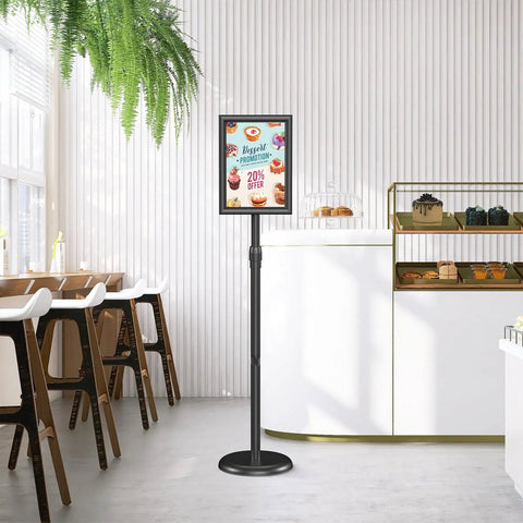 Sign Holder Floor Stand 8.5x11 Inch With Adjustable Height And Tilt Heavy Duty Base Snap Open Frame Display in a bakery setting