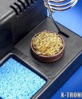 Pro Grade 75W Soldering Iron Station with LED Display, brass sponge with flux, and wet sponge on workstation base