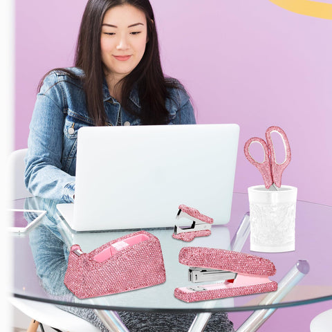 Woman at desk with Sparkle Pink 4Pc Stapler And Tape Dispenser Set With Rhinestones Includes Pink Scissors And Staple Remover