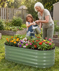 Galvanized Raised Garden Bed Kit Four By Two By Seventeen Inch Tall Beefy Back Friendly Metal Planter with flowers outdoors