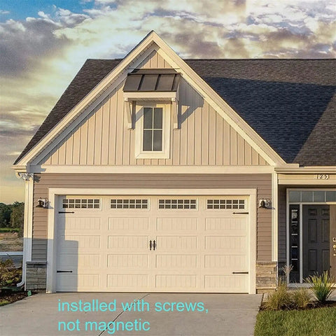 Front view of a garage door with 6 piece decorative garage door hinge handles steel hardware kit for metal doors wooden doors and more with silent hydraulic buffer and soft close for heavy duty aluminum and steel doors.