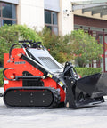 Side view of Mini Skid Steer Loader 1800 Lb Capacity With Four In One Bucket Attachment in a plaza setting