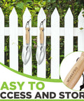 11 Inch Garden Hand Trowel With Wood Handle, Tough As Nails Heavy Duty Polished Stainless Steel Digging Tool hanging on fence