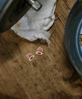 50Pcs M6x10mm Wood Threaded Insert Nuts Kit with countersunk flange on wooden surface