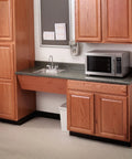 Wooden kitchen setup with a commercial bar and pantry faucet 2.2 GPM chrome finish and microwave nearby.