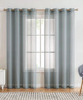 Faux Linen Sheer Curtains 54 by 63 Inches Set of 2 hanging on window, nickel grommets, in modern living room, light filtering
