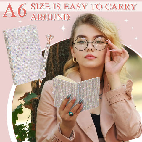 Woman holding Bling Rhinestone Notebook Set Glitter Pocket Journal With Crystal Pen Mini Diamond Diary Hardcover For Women A6 Size Silver Office Desk Accessories Birthday Gift in outdoor setting.