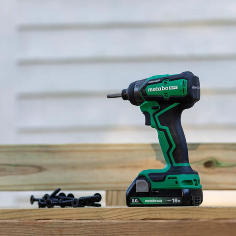 Cordless 18V Impact Driver Sub-Compact Brushless, 1/4 In Hex shown on wooden surface with screws, outdoor setting