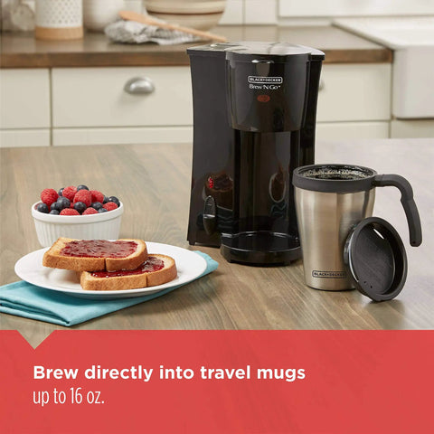 On The Go Personal Coffee Maker Brews 15 Ounces Directly Into A Stainless Steel Travel Mug with toast and berries on the side