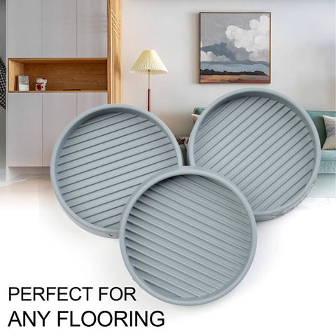 Image of three gray 3-inch round rubber furniture caster cups for beds and couches, non-slip pads for all floor types.