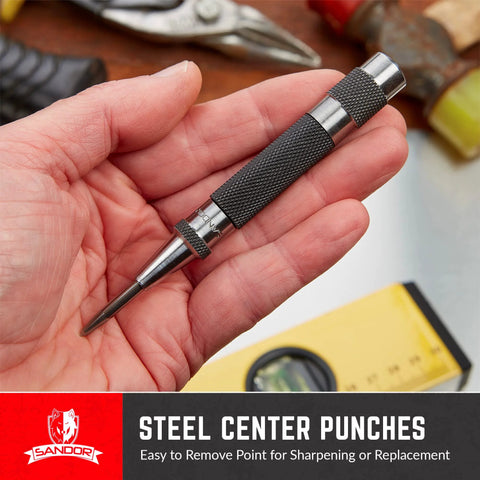 Center punch tool with knurled black grip and pointed steel tip, held in hand.