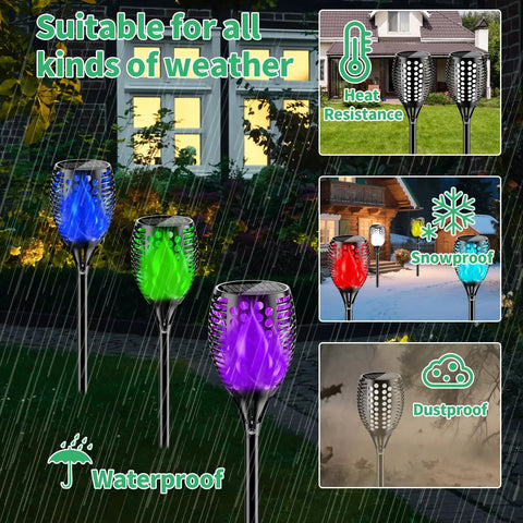 Outdoor RGB Solar Flame Lights 4 Pack With Seven Color Flickering Fire Effect in rain showing waterproof feature, glowing in varied colors.