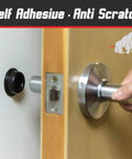 Soft Rubber Door Stopper Bumpers Pack Of Four Black Self Adhesive Wall Protectors To Stop Wall Dings From Doorknobs And Handles Cushion And Quiet Your Doors With Noise Dampening Protection shown installed behind a door handle preventing wall damage.
