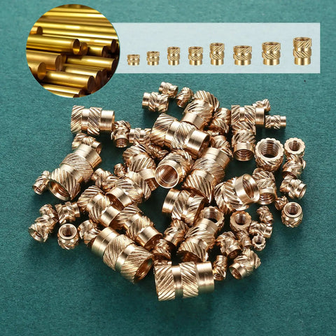 Brass Threaded Inserts Kit With Knurled Heat Set Nuts M2 M2.5 M3 M4 M5 M6 And 1/4 20 Female Thread For 3D Printing And Injection Molding 370 Pieces Pro Grade Embedding Nuts displayed on a green surface, showing various sizes and patterns.