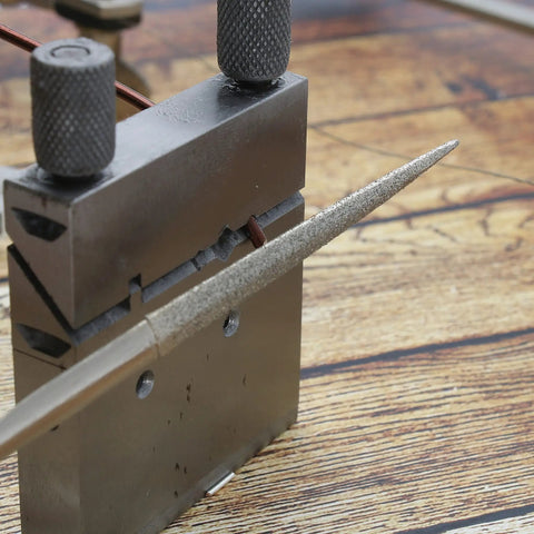 Swiss Style Miter Cutting Vise Jig for Metalworking, Solid Steel Build, 2.75 by 2 Inches, shown holding wire and file for accuracy.