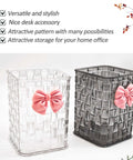 Clear White Acrylic Desk Pen And Makeup Brush Holder With Woven Texture Bow Accent alongside black holder.