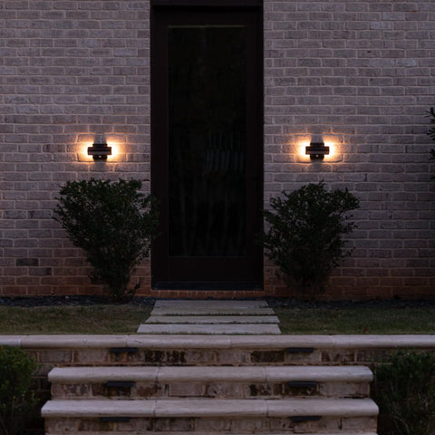 Architectural Outdoor Solar Wall Light With Motion Sensor 120 Lumens Dual Color Dual Action Aluminum Bronze 2 Pack beside door