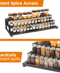 Score Top Shelf Storage With This Slick Adjustable 3 Tier Metal Spice Rack Organizer For Cabinets Counters Slip Resistant Expandable Shelf Fits Jars And Bottles In Black displaying spices in various jars.