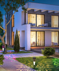 Modern house at night with Solar Powered Pathway Lights 4 Pack Multicolor Outdoor Garden Lights IP67 Waterproof illuminating walkway