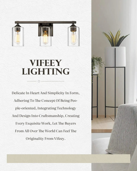 Three Light Vanity Lights With Dope Oil Rubbed Bronze Finish And Clear Glass Shades displayed on a promotional background featuring Vifeey Lighting text and a modern home setting.