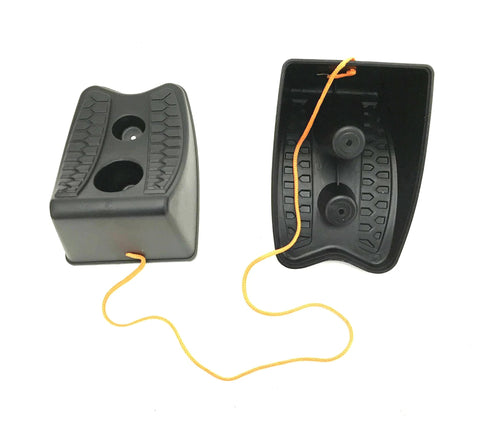 Front and side views of a set of two black heavy-duty wheel chocks connected by an orange rope.