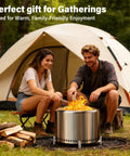 Couple enjoying 20 Inch Smokeless Patio Fire Pit For Backyard Hangouts, Garden And Patio, Stainless Steel Outdoor Wood Burning Fire Pit With Double Wall Vent System And Removable Ash Pan For Cleaner Burns And Less Smoke