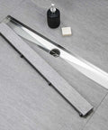 24 Inch Linear Shower Drain Kit With Invisible Tile Insert And Flat Cover, Brushed 304 Stainless Steel installed in grey tile floor