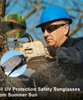 Man wearing Tinted Safety Glasses 80 Pack Bulk ANSI Z87.1 UV Protection Eyewear, using chainsaw outdoors for construction work