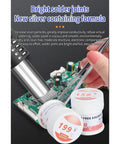 Applying Non Corrosive Solder Paste For Electronics Repair on PCB, visible labels showing 158°C and 199°C solder paste jars