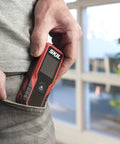 Person holding 65 Feet Laser Distance Measurer With Wheel Measuring Mode For Uneven Surfaces compact handheld tool.