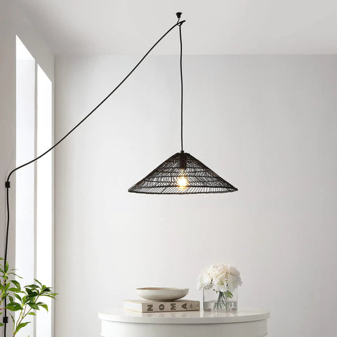 Black 1 Light Farmhouse Coastal LED Pendant with rattan cone shade hanging over table