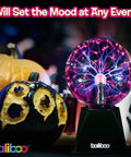 6 Inch Plasma Ball Light With Touch And Sound Activation Lightning Globe on table with pumpkins for party decor